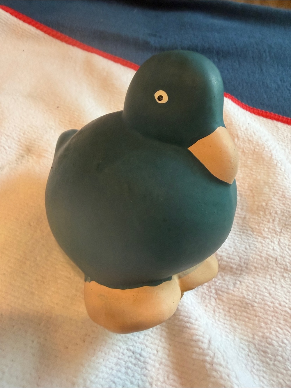 Cute green duck figurine